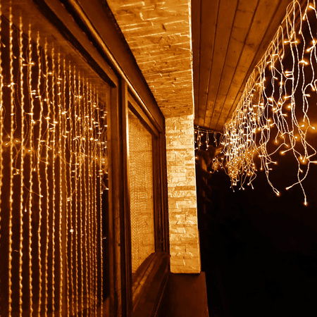 Kurtyna świetlna 200 led girlanda, lampki wewnętrzno-zewnętrzne sople ciepły biały